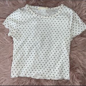 White shirt with stars.